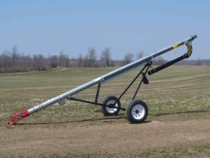 seed and fertilizer transport auger in field